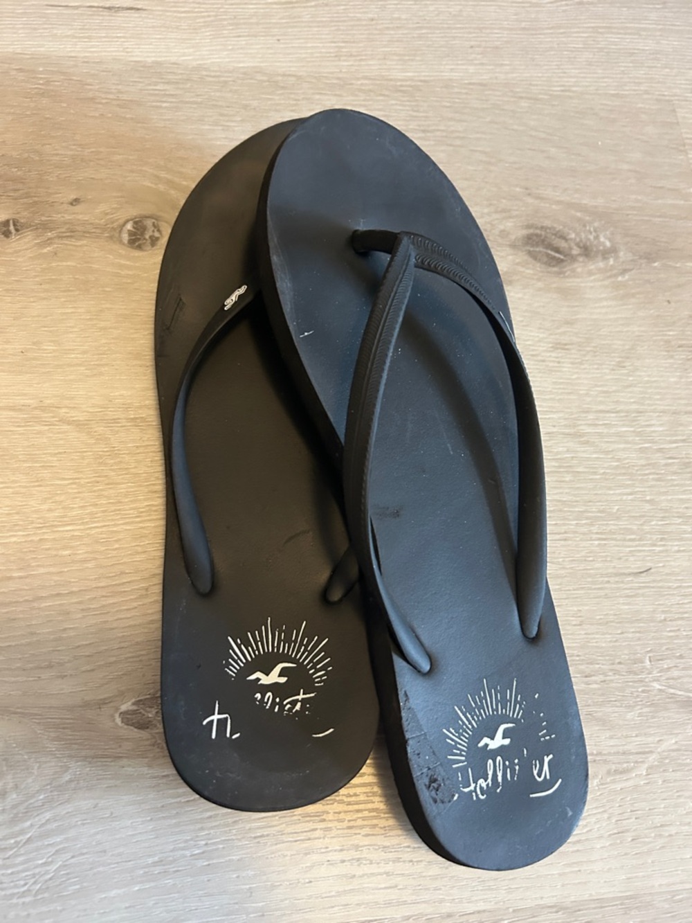 Hollister Black Flip Flop Sandals with Logo Sunburst